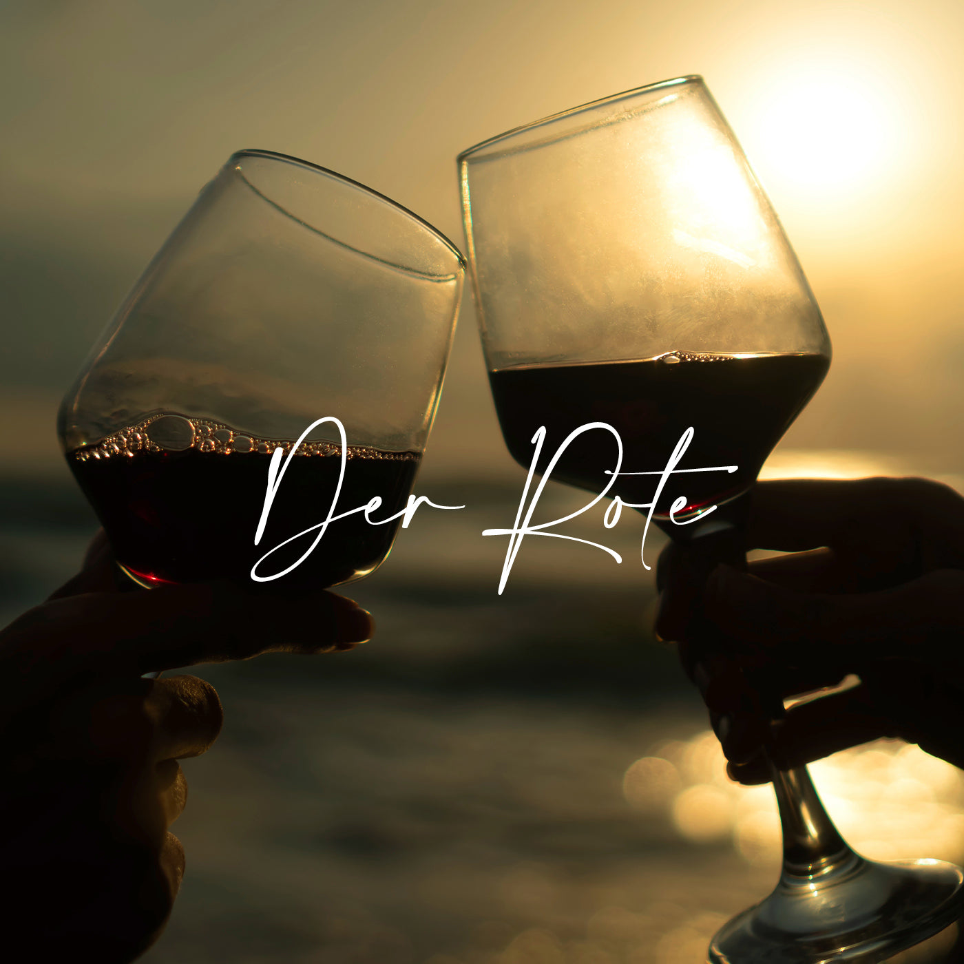 Rotweine aus Portugal von der Vinho Bar in Wuppertal. Bild mit zwei Rotweingläsern am Meer bei einem Sonnenuntergang.