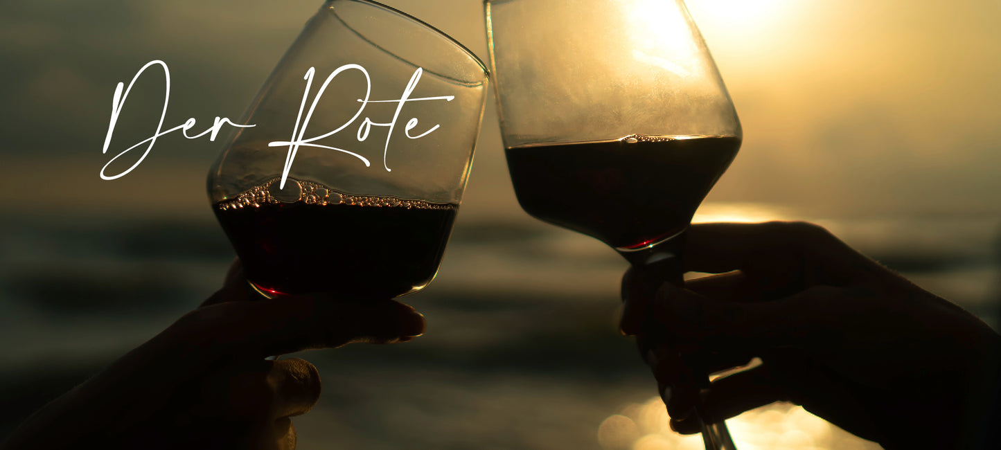 Rotweine aus Portugal von der Vinho Bar in Wuppertal. Bild mit zwei Rotweingläsern am Meer bei einem Sonnenuntergang.